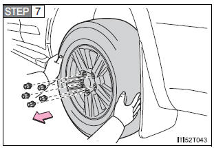 Replacing a flat tire