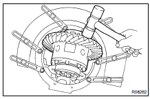 INSTALL DIFFERENTIAL CASE IN CARRIER