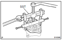 REMOVE COIL ASSEMBLY
