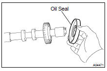 REMOVE OIL SEAL FROM INTAKE CAMSHAFT