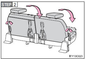 Push the seatback angle levers