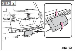 Removing hitch cover