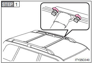 Adjusting the position of cross rails (if equipped)