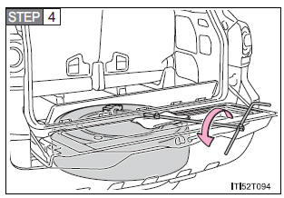 Taking out the spare tire
