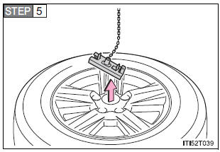 Taking out the spare tire