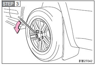 Replacing a flat tire