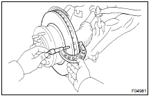 MEASURE DISC RUNOUT