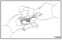 REMOVE PISTON SEALS FROM BRAKE CYLINDER