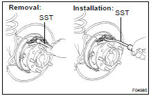 REMOVE SHOE RETURN SPRINGS