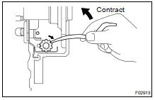 (a) Disconnect the parking brake cable from the bellcrank.