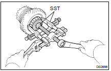 REMOVE FRONT TAPER ROLLER BEARING