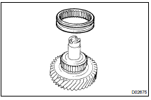 REMOVE HIGH AND LOW CLUTCH SLEEVE FROM IDLER GEAR