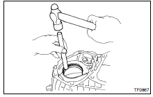 REMOVE 2 BEARING RACES FROM FRONT CASE