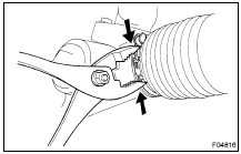 REMOVE RH AND LH CLIPS, RACK BOOTS AND CLAMPS