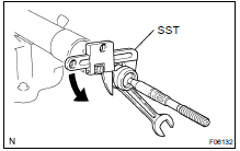 REMOVE RH AND LH RACK ENDS AND CLAW WASHERS