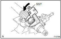 REMOVE RACK GUIDE SPRING CAP LOCK NUT