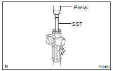 (a) Using SST, press out the rack and oil seal.