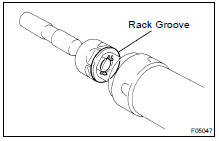  INSTALL RH AND LH CLAW WASHERS AND RACK ENDS