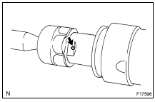 INSTALL RH AND LH RACK BOOTS, CLAMPS AND CLIPS