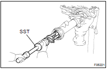 REMOVE SIDE GEAR SHAFT OIL SEALS