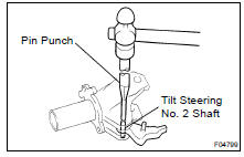 (a) Using a pin punch and hammer, tap out the tilt steering