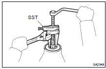 REMOVE OIL SEAL AND OIL SLINGER