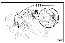 (a) Install the bearing thrust collar and compression spring to