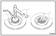 INSTALL INNER BEARING AND OIL SEAL