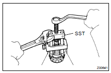 REMOVE FRONT BEARING