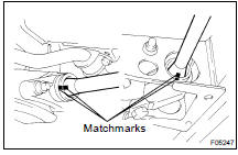 (a) Place matchmarks on the torsion bar spring, anchor arm