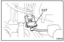 DISCONNECT STEERING KNUCKLE FROM UPPER SUSPENSION ARM