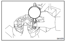 MEASURE SIDE GEAR BACKLASH AND ASSEMBLE DIFFERENTIAL CASE