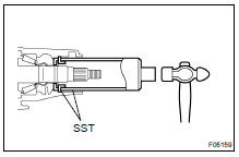 INSTALL BEARING SPACER AND OIL STORAGE RING