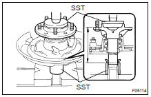  INSTALL ABS SPEED SENSOR ROTOR AND BEARING RETAINER