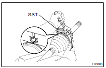 INSTALL OUTBOARD JOINT BOOT AND CLAMPS