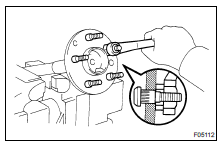  INSTALL OIL DEFLECTOR