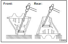 REMOVE FRONT AND REAR BEARING OUTER RACES