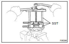 REMOVE SIDE BEARINGS FROM DIFFERENTIAL CASE