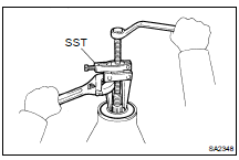 REMOVE OIL SEAL AND OIL SLINGER