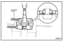 (a) Using SST and a press, remove the rear bearing from the