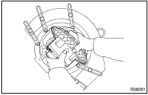 INSTALL DIFFERENTIAL CASE IN CARRIER