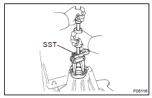 Using SST, remove the bearing outer race.