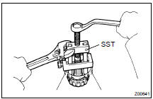 REMOVE FRONT BEARING