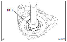 REPLACE FRONT BEARING