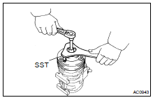 (a) Using SST and a socket wrench, remove the shaft bolt.