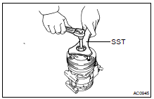 (c) Using SST and socket wrench, remove the pressure