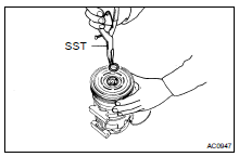 (a) Using SST, remove the snap ring.