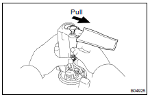 REMOVE FUEL PUMP FROM FUEL PUMP BRACKET