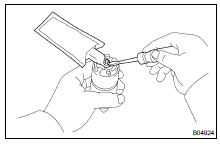 REMOVE FUEL PUMP FILTER FROM FUEL PUMP