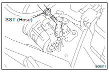 (c) Connect SST (hose) and fuel tube connector to the fuel